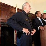 brattonleft LAPD Chief William J. Bratton listens as Mayor Antonio Villaraigosa announces Bratton's resignation. At right is John Mack, a member of the Police Commission.