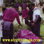 Grape Street Crips from Watts Los Angeles during a funeral. Photo from Newsweek Magazine March 28, 1988 page 28 